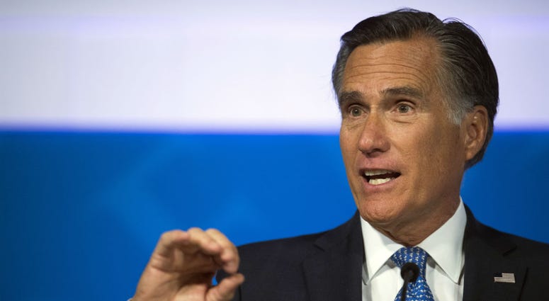This Oct. 9, 2018, file photo shows Republican U.S. Senate candidate Mitt Romney answering a question about tariffs during the debate with Democratic opponent Jenny Wilson in the America First Event Center in Cedar City, Utah. This Oct. 9, 2018, file photo shows Republican U.S. Senate candidate Mitt Romney answering a question about tariffs during the debate with Democratic opponent Jenny Wilson in the America First Event Center in Cedar City, Utah.