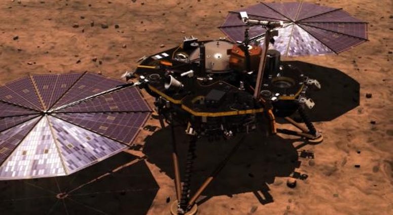 NASA celebrates Mars landing with an epic handshake. CNN's Jeanne Moos reports on the touchdown that inspired lots of touching. All eyes on Mars as NASA lander touched down