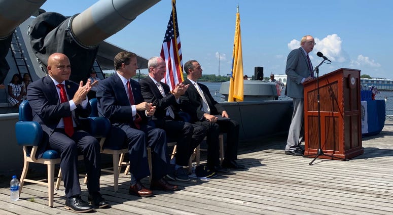 New Jersey Congressman Donald Norcross (second from left) and N.J. Gov. Phil Murphy (second from right) spoke at a Fourth of July naturalization ceremony on the Battleship New Jersey. New Jersey Congressman Donald Norcross (second from left) and N.J. Gov. Phil Murphy (second from right) spoke at a Fourth of July naturalization ceremony on the Battleship New Jersey.