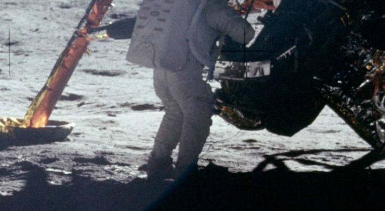 A photograph of Neil Armstrong taken by Buzz Aldrin. This is one of the few photographs of Armstrong on the lunar surface; most of the time he had the camera. A photograph of Neil Armstrong taken by Buzz Aldrin. This is one of the few photographs of Armstrong on the lunar surface; most of the time he had the camera.