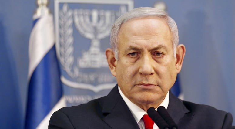 In this Nov. 18, 2018 file photo, Israeli Prime Minister Benjamin Netanyahu delivers a statement in Tel Aviv, Israel. In this Nov. 18, 2018 file photo, Israeli Prime Minister Benjamin Netanyahu delivers a statement in Tel Aviv, Israel.