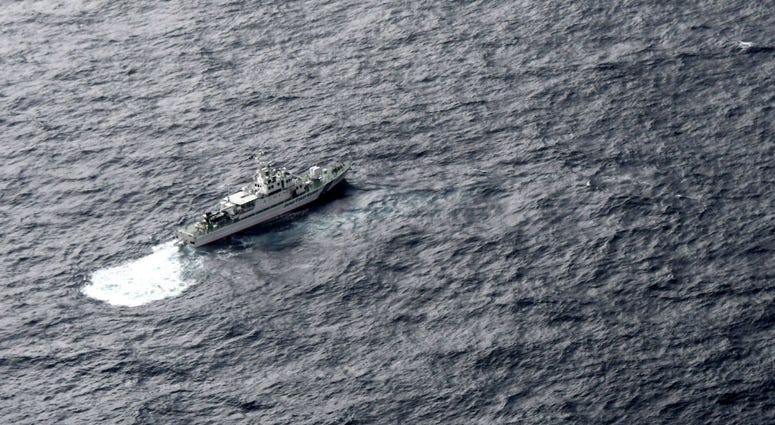 In this aerial photo, Japan's Coast Guard ship is seen at sea during a search operation for U.S. Marine refueling plane and fighter jet off Muroto, Kochi prefecture, southwestern Japan, Thursday, Dec. 6, 2018. In this aerial photo, Japan's Coast Guard ship is seen at sea during a search operation for U.S. Marine refueling plane and fighter jet off Muroto, Kochi prefecture, southwestern Japan, Thursday, Dec. 6, 2018.