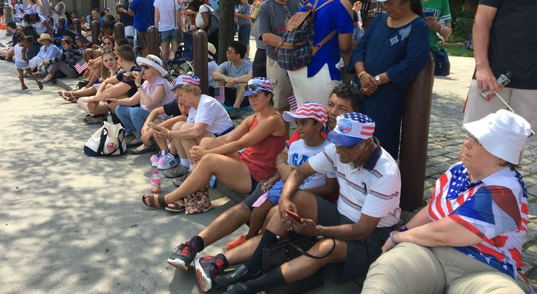 People wait along Independence Mall in Philadelphia for the 2019 Independence Day Parade to start. People wait along Independence Mall in Philadelphia for the 2019 Independence Day Parade to start.