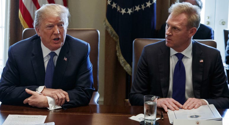 In this April 9, 2018, file photo, Deputy Secretary of Defense Patrick Shanahan, right, listen as President Donald Trump speaks during a cabinet meeting at the White House, in Washington. In this April 9, 2018, file photo, Deputy Secretary of Defense Patrick Shanahan, right, listen as President Donald Trump speaks during a cabinet meeting at the White House, in Washington.