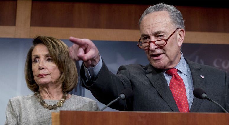 In this Jan. 25, 2019, file photo, Senate Minority Leader Sen. Chuck Schumer of N.Y., accompanied by Speaker Nancy Pelosi of Calif., left, calls on a reporter during a news conference on Capitol Hill in Washington. In this Jan. 25, 2019, file photo, Senate Minority Leader Sen. Chuck Schumer of N.Y., accompanied by Speaker Nancy Pelosi of Calif., left, calls on a reporter during a news conference on Capitol Hill in Washington.