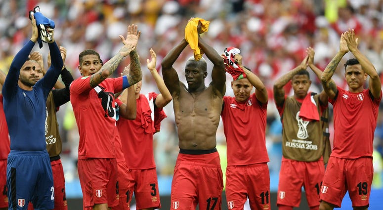 Peruvian players applaud after winning 2-0 during the group C match between Australia and Peru, at the 2018 soccer World Cup in the Fisht Stadium in Sochi, Russia, Tuesday, June 26, 2018. Peruvian players applaud after winning 2-0 during the group C match between Australia and Peru, at the 2018 soccer World Cup in the Fisht Stadium in Sochi, Russia, Tuesday, June 26, 2018.