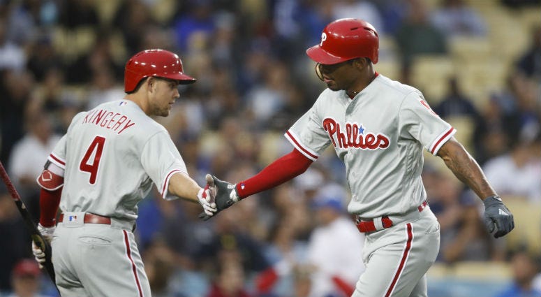 Philadelphia Phillies' Nick Williams, right, celebrates his home run with Scott Kingery during the second inning of the team's baseball game against the Los Angeles Dodgers, Tuesday, May 29, 2018, in Los Angeles. Philadelphia Phillies' Nick Williams and Scott Kingery