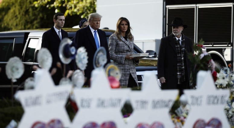 President Donald Trump, first lady Melania Trump, Ivanka Trump and Jared Kushner visit a memorial outside Pittsburgh's Tree of Life Synagogue in Pittsburgh, Tuesday, Oct. 30, 2018. President Donald Trump, first lady Melania Trump, Ivanka Trump and Jared Kushner visit a memorial outside Pittsburgh's Tree of Life Synagogue in Pittsburgh, Tuesday, Oct. 30, 2018.