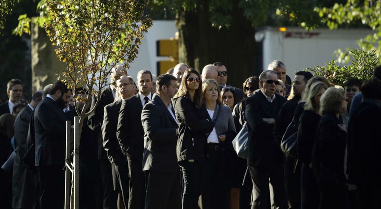 Mourners gather outside Rodef Shalom Congregation before the funeral services for brothers Cecil and David Rosenthal, Tuesday, Oct. 30, 2018, in Pittsburgh. Mourners gather outside Rodef Shalom Congregation before the funeral services for brothers Cecil and David Rosenthal, Tuesday, Oct. 30, 2018, in Pittsburgh.