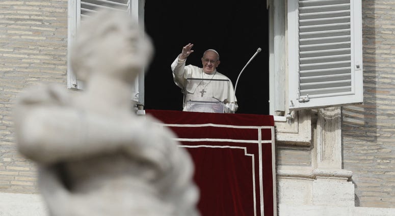 Pope Francis waves to faithful during the Angelus noon prayer in St. Peter's Square, at the Vatican, Sunday, Dec. 16, 2018. Pope Francis waves to faithful during the Angelus noon prayer in St. Peter's Square, at the Vatican, Sunday, Dec. 16, 2018.