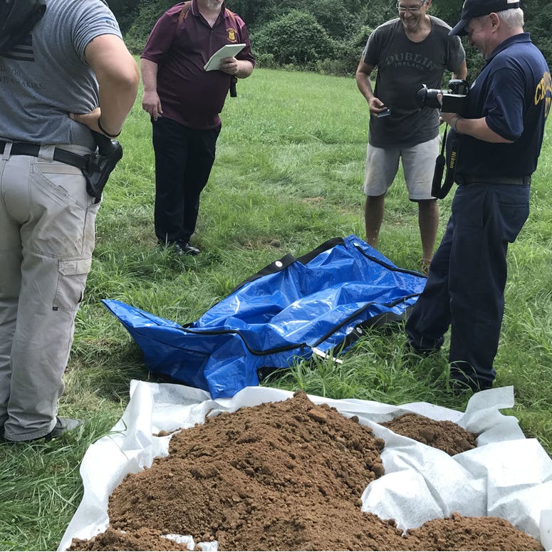 Forensic experts unearth a body buried in a Philadelphia potter's field. Forensic experts unearth a body buried in a Philadelphia potter's field.