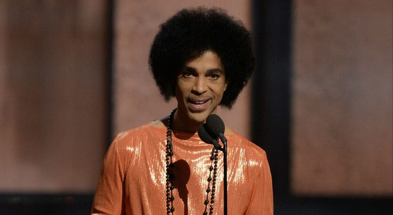 FILE PHOTO; Recording artist Prince presents the award for the album of the year at the 57th Grammy Awards FILE PHOTO; Recording artist Prince presents the award for the album of the year at the 57th Grammy Awards