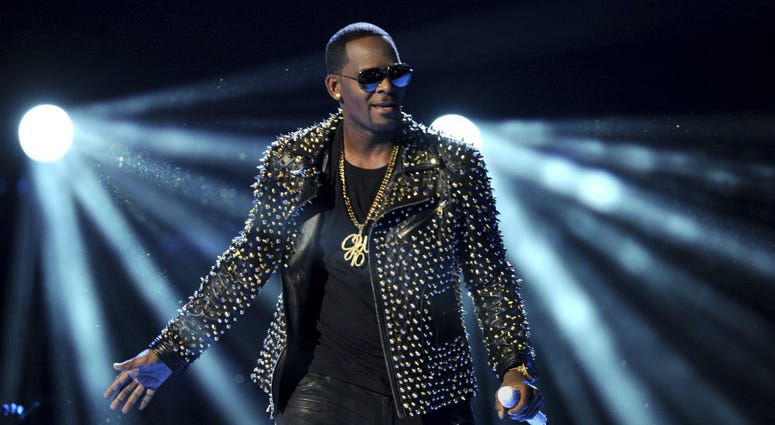 In this June 30, 2013 file photo, R. Kelly performs at the BET Awards at the Nokia Theatre in Los Angeles. In this June 30, 2013 file photo, R. Kelly performs at the BET Awards at the Nokia Theatre in Los Angeles.