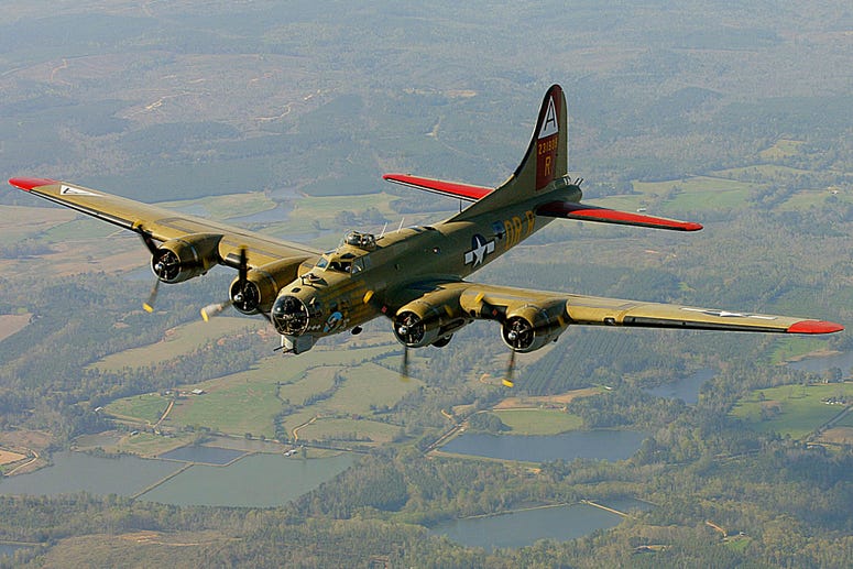 In this April 2, 2002, file photo, the Nine-O-Nine, a Collings Foundation B-17 Flying Fortress, flies over Thomasville, Ala., during its journey from Decatur, Ala., to Mobile, Ala. In this April 2, 2002, file photo, the Nine-O-Nine, a Collings Foundation B-17 Flying Fortress, flies over Thomasville, Ala., during its journey from Decatur, Ala., to Mobile, Ala.