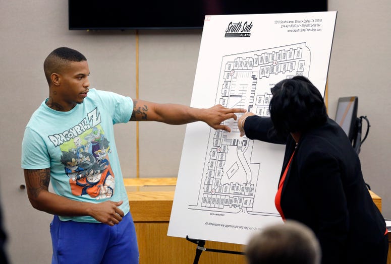 Botham Jean's neighbor Joshua Brown, left, answers questions from Assistant District Attorney LaQuita Long, right, while pointing to a map of the South Side Flats where he lives. Botham Jean's neighbor Joshua Brown, left, answers questions from Assistant District Attorney LaQuita Long, right, while pointing to a map of the South Side Flats where he lives.