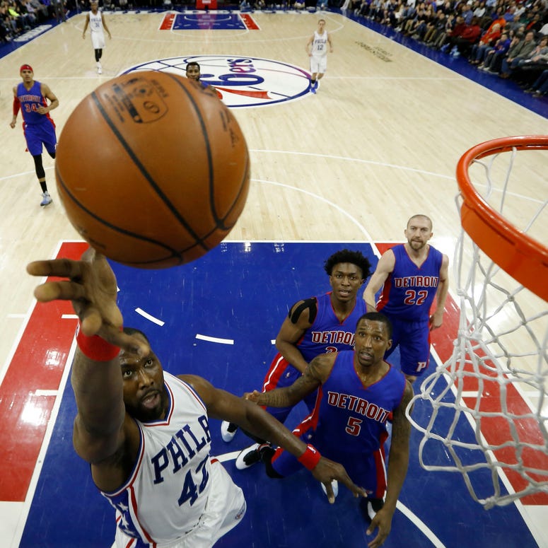 In this March 12, 2016, file photo, Philadelphia 76ers' Elton Brand, left, releases a shot during the first half of the team's NBA basketball game against the Detroit Pistons in Philadelphia. Elton Brand