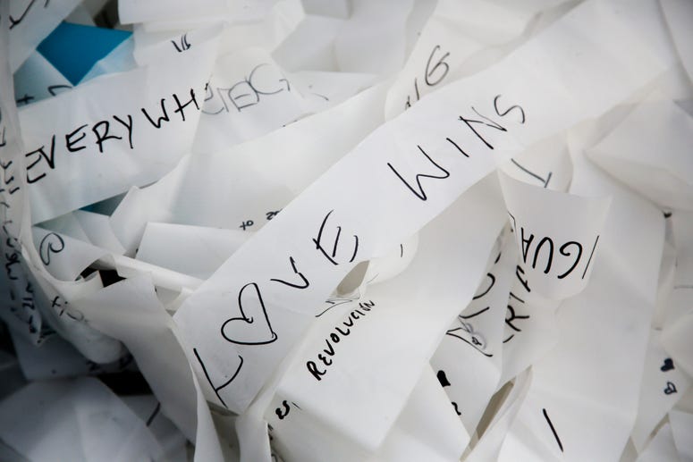 Streamers with written messages as part of the skynet artwork 'Visions In Motion' lay on the ground prior to the setup of the artwork at the 'Strasse des 17. Juni' (Street of June 17) boulevard in front of the Brandenburg Gate in Berlin, Germany. Streamers with written messages as part of the skynet artwork 'Visions In Motion' lay on the ground prior to the setup of the artwork at the 'Strasse des 17. Juni' (Street of June 17) boulevard in front of the Brandenburg Gate in Berlin, Germany.