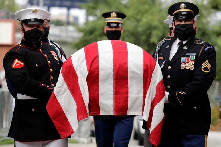A military honor guard moves the casket of Rep. John Lewis into Ebenezer Baptist Church for his funeral, Thursday, July 30, 2020, in Atlanta. A military honor guard moves the casket of Rep. John Lewis into Ebenezer Baptist Church for his funeral, Thursday, July 30, 2020, in Atlanta.