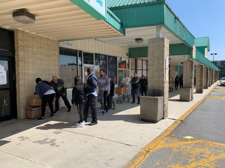 People wait in line at Total Wine and More in Delaware. Total Wine and More in Delaware.