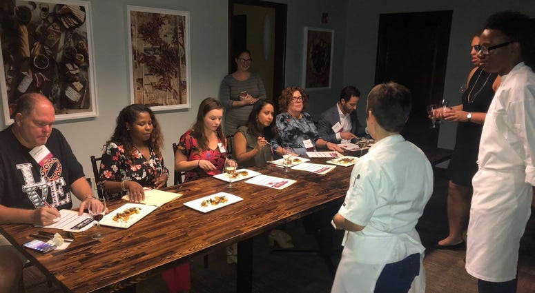 Judges taste an appetizer at the Great Philly Cook Off. Great Philly Cook Off