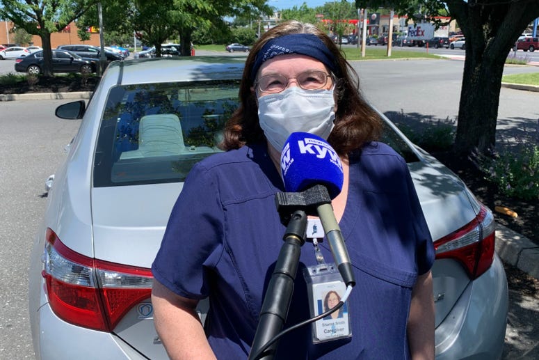 Sharon says wearing a mask is required for her as a home health-care aide, but clients aren’t required to wear them. Sharon says wearing a mask is required for her as a home health-care aide, but clients aren’t required to wear them.