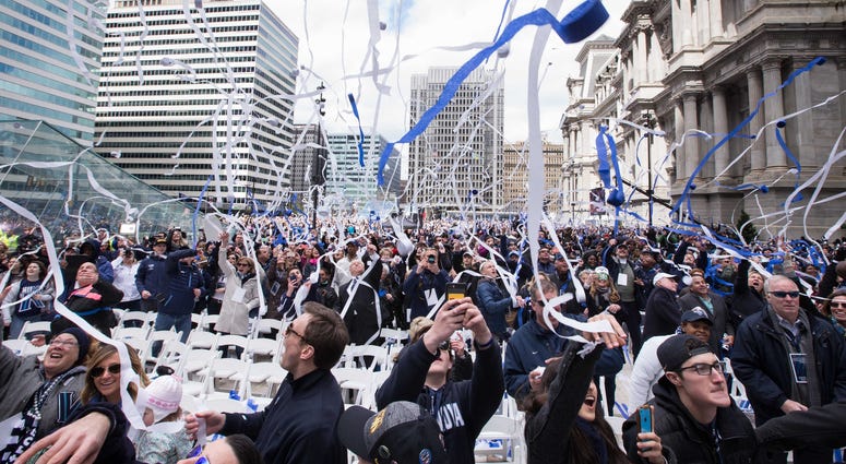 Villanova Wildcats fans throw streamers into the air as they celebrate at the championship parade at Dilworth Park. 2016 Villanova Parade