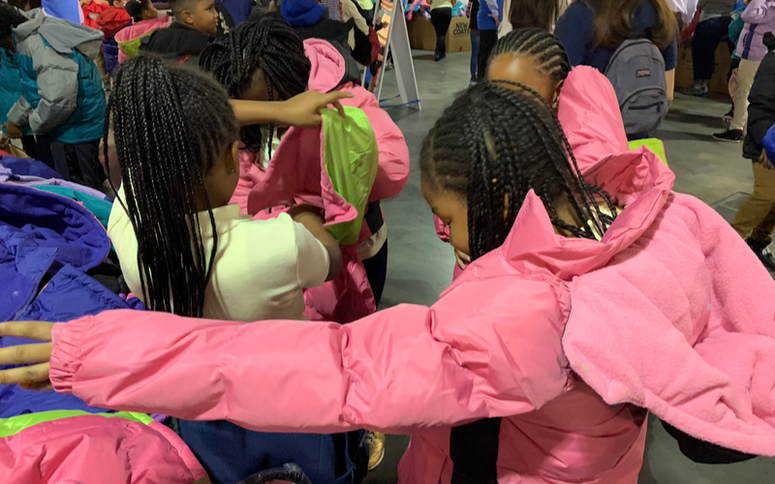More than 1,000 students from four elementary schools within the School District of Philadelphia had the chance to pick out new winter coats during the Driving Away the Cold event at the Pennsylvania Convention Center, Oct. 8, 2019. Driving Away the Cold event