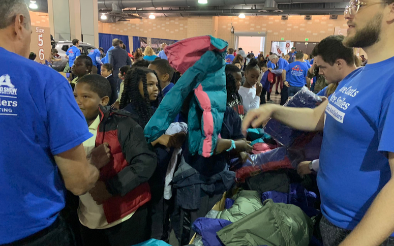 More than 1,000 students from four elementary schools within the School District of Philadelphia had the chance to pick out new winter coats during the Driving Away the Cold event at the Pennsylvania Convention Center, Oct. 8, 2019. Driving Away the Cold event