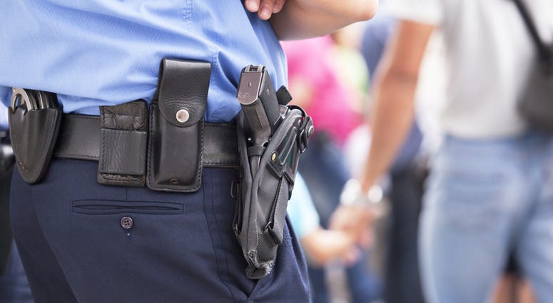 Police officer on duty, taking care of citizens' security Police Generic