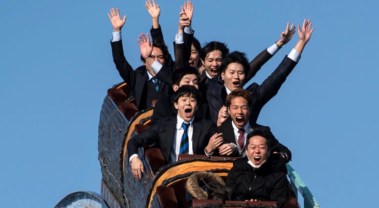 Theme parks in Japan have issued guidelines suggesting visitors keep quiet and wear masks while on rides, making scenes like this a thing of the past. Japan Toshimaen Amusement Park