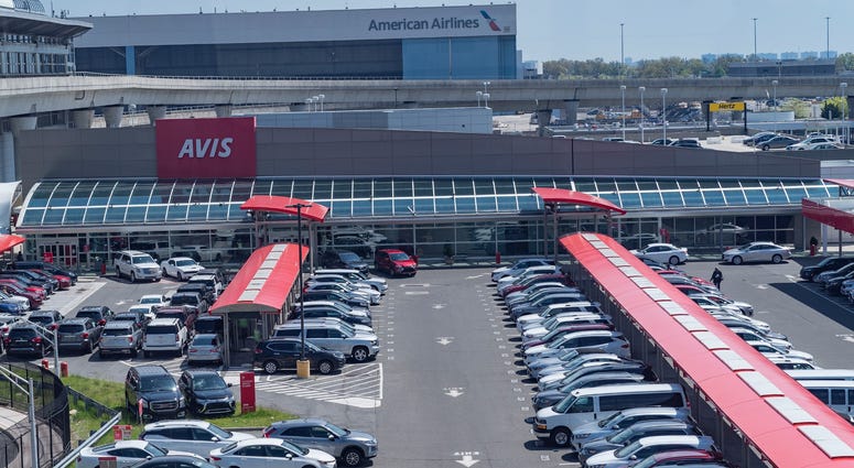 Car rental AVIS parking lot is full since there are no customers during COVID-19 pandemic at JFK airport. Avis Rental Parking Lot