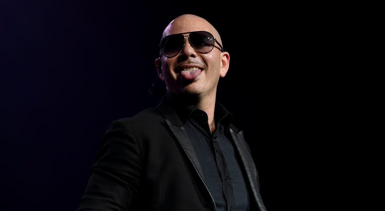 Dec 09, 2016; Hollywood, FL, USA; Pitbull performs at Hard Rock Live. Dec 09, 2016; Hollywood, FL, USA; Pitbull performs at Hard Rock Live.