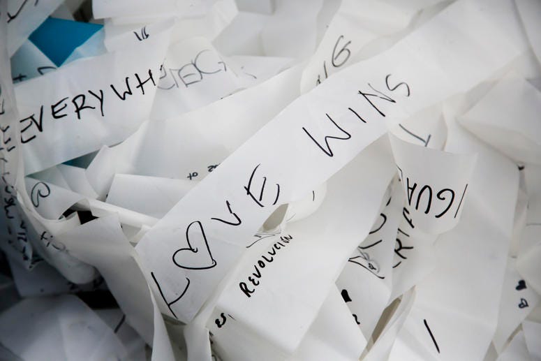 Streamers with written messages as part of the skynet artwork 'Visions In Motion' lay on the ground prior to the setup of the artwork at the 'Strasse des 17. Juni' (Street of June 17) boulevard in front of the Brandenburg Gate in Berlin, Germany. Streamers with written messages as part of the skynet artwork 'Visions In Motion' lay on the ground prior to the setup of the artwork at the 'Strasse des 17. Juni' (Street of June 17) boulevard in front of the Brandenburg Gate in Berlin, Germany.