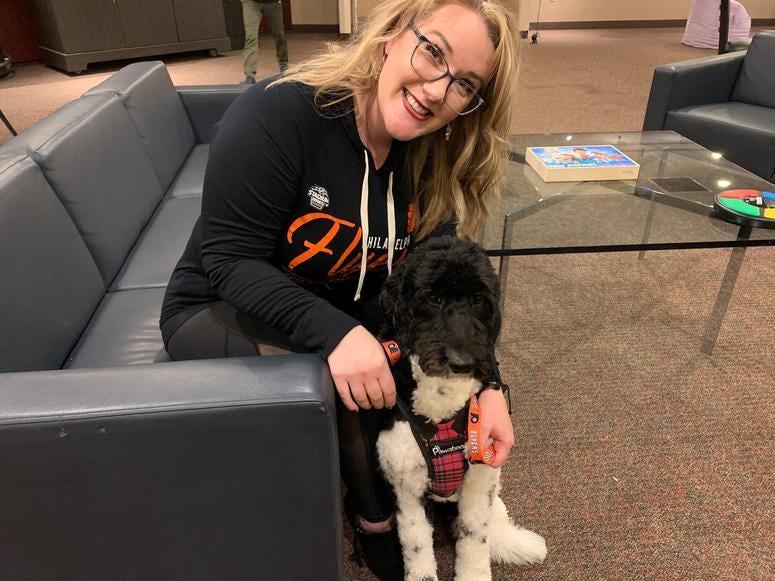 Neuropsychologist Jennifer West-Gavin with service companion dog Lullaby. Neuropsychologist Jennifer West-Gavin with service companion dog Lullaby.