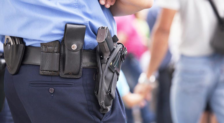 Police officer on duty, taking care of citizens' security Police Generic