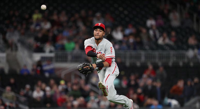 Mar 30, 2018; Atlanta, GA, USA; Philadelphia Phillies shortstop J.P. Crawford (2) throws to first base for the out of Atlanta Braves catcher Chris Stewart (not pictured) in the tenth inning at SunTrust Park. Mar 30, 2018; Atlanta, GA, USA; Philadelphia Phillies shortstop J.P. Crawford (2) throws to first base for the out of Atlanta Braves catcher Chris Stewart (not pictured) in the tenth inning at SunTrust Park.