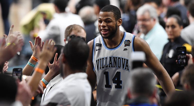 Mar 31, 2018; San Antonio, TX, United States; Villanova Wildcats forward Omari Spellman (14) celebrates with fans after defeating the Kansas Jayhawks in the semifinals of the 2018 men's Final Four at Alamodome. Mar 31, 2018; San Antonio, TX, United States; Villanova Wildcats forward Omari Spellman (14) celebrates with fans after defeating the Kansas Jayhawks in the semifinals of the 2018 men's Final Four at Alamodome.