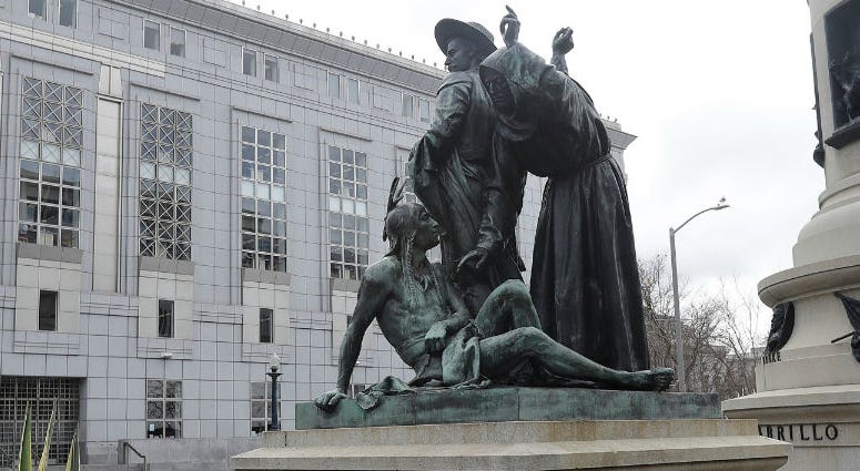 This March 2, 2018 file photo shows a statue that depicts a Native American at the feet of a Spanish cowboy and Catholic missionary in San Francisco. This March 2, 2018 file photo shows a statue that depicts a Native American at the feet of a Spanish cowboy and Catholic missionary in San Francisco.