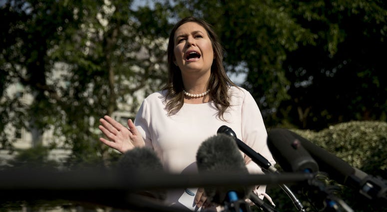 White House press secretary Sarah Huckabee Sanders takes a question from a reporter on the North Lawn outside the West Wing at the White House in Washington, Thursday, May 23, 2019. White House press secretary Sarah Huckabee Sanders takes a question from a reporter on the North Lawn outside the West Wing at the White House in Washington, Thursday, May 23, 2019.