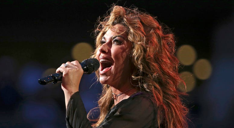 Shania Twain is shown performing during opening ceremonies for the U.S. Open tennis tournament in New York. Shania Twain