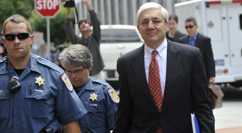 Former Penn State president Graham Spanier, accused of covering up Jerry Sandusky abuse allegations, leaves his preliminary hearing in Harrisburg in July 2013. Former Penn State president Graham Spanier, accused of covering up Jerry Sandusky abuse allegations, leaves his preliminary hearing in Harrisburg in July 2013.