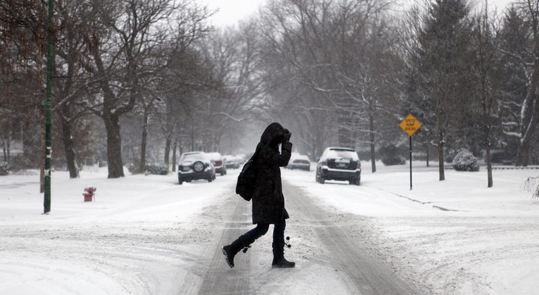 A woman walks in Chicago, Illinois A woman walks in Chicago, Illinois