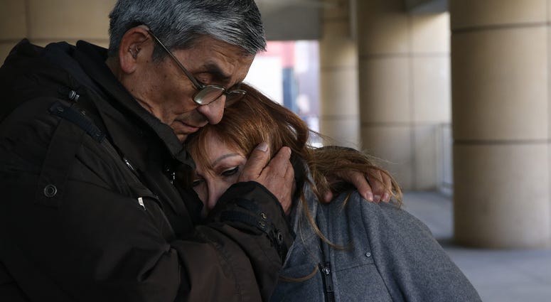 Esperanza Perez, mother of Miguel Perez, is comforted by Luis Retamal after receiving news that her son was denied U.S. citizenship on Thursday, March 15, 2018. Esperanza Perez, mother of Miguel Perez, is comforted by Luis Retamal after receiving news that her son was denied U.S. citizenship on Thursday, March 15, 2018.