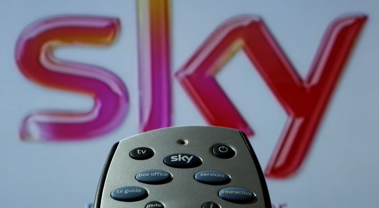 Britain's government says it does not intend to refer U.S. media conglomerate Comcast's 22 billion pound ($30.7 billion) takeover offer for London-based Sky to competition authorities. Sky HD TV remote