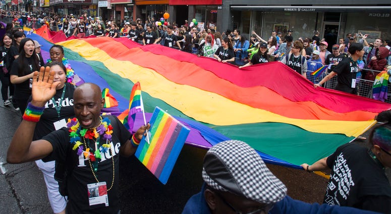 People take part in the 2018 Toronto Pride Parade People take part in the 2018 Toronto Pride Parade