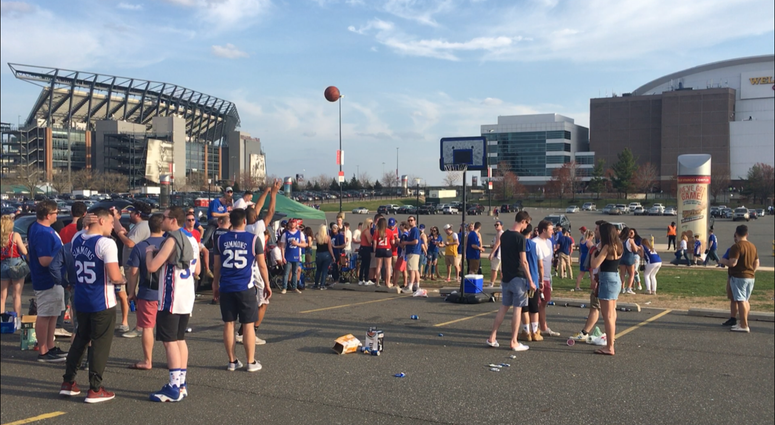 Sixers fans tailgate outside the Wells Fargo Center. Sixers fans tailgate outside the Wells Fargo Center.