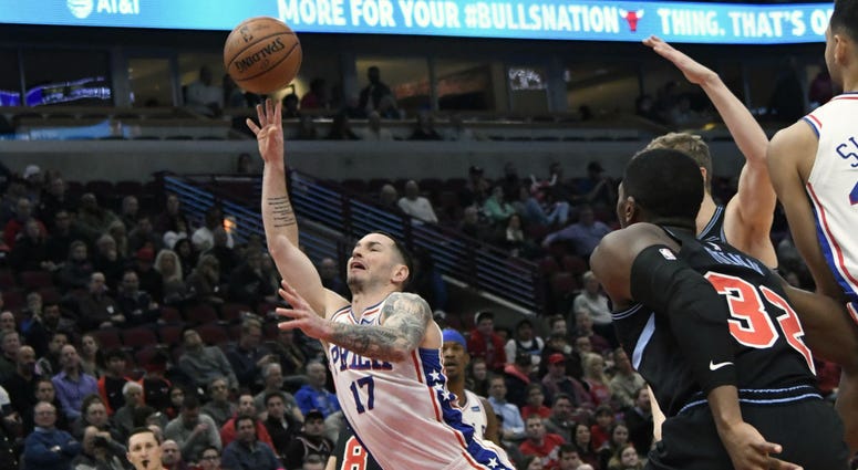 Philadelphia 76ers guard JJ Redick (17) shoots the ball against the Chicago Bulls during the first half of an NBA basketball game Wednesday, March 6, 2019, in Chicago. Philadelphia 76ers guard JJ Redick (17) shoots the ball against the Chicago Bulls during the first half of an NBA basketball game Wednesday, March 6, 2019, in Chicago.