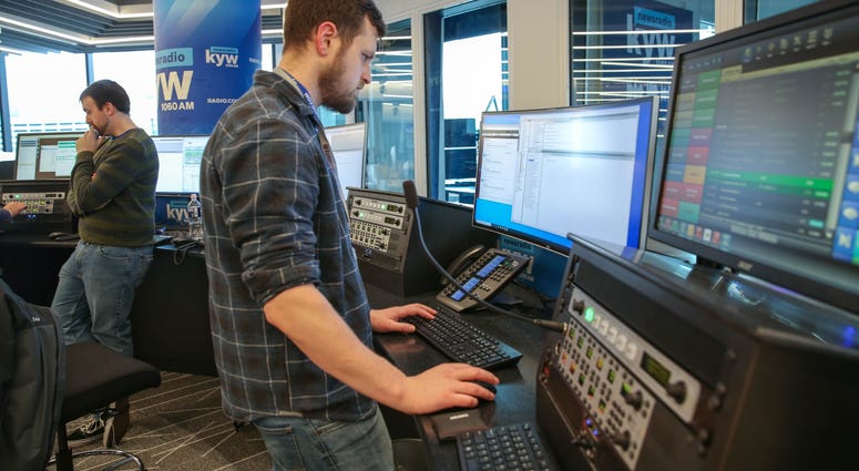News production assistant Phillip Casey and writer Conner Barkon man the new KYW Newsradio editor's desk at 2400 Market. News production assistant Phillip Casey and writer Conner Barkon man the new KYW Newsradio editor's desk at 2400 Market.