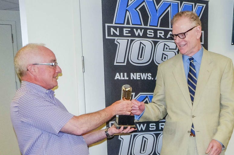 Steve Butler, director of news and programming at KYW Newsradio, presents retired reporter Tony Hanson with his Hall of Fame award. Steve Butler, director of news and programming at KYW Newsradio, presents retired reporter Tony Hanson with his Hall of Fame award.