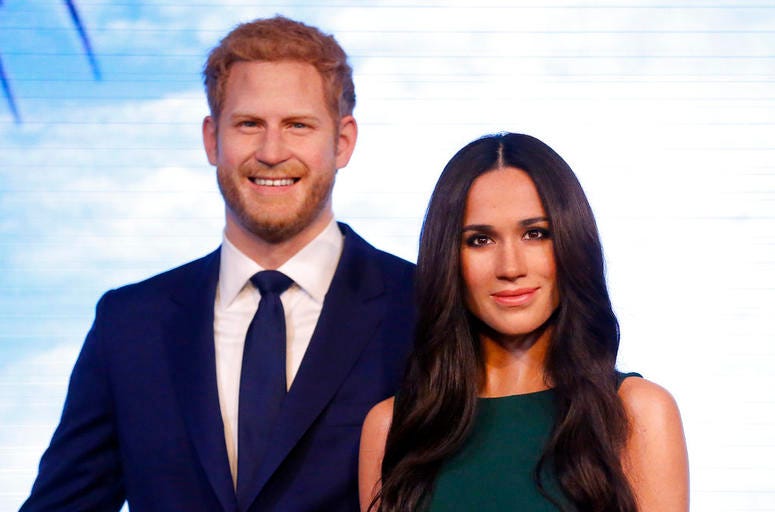 Britain's Prince Harry and his fiancee Meghan Markle are on display as wax figures at Madame Tussauds in London. Britain's Prince Harry and his fiancee Meghan Markle are on display as wax figures at Madame Tussauds in London.